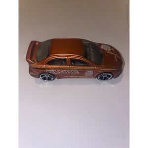 hot wheels 2008 Lancer Evolution exclusive satin burnt orange, chrome base 1/64